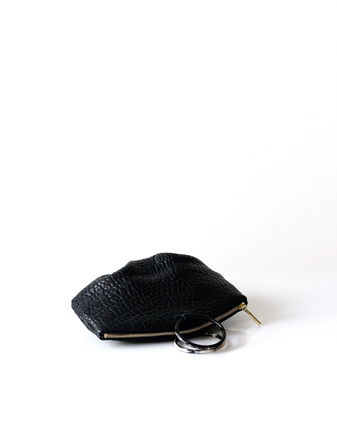 Pochette Horn Ring | Shrunken Lamb - Opelle bag Shrunken Lamb - Opelle leather handbag handcrafted leather bag toronto Canada